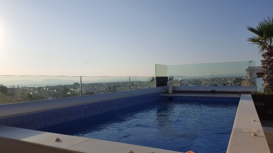 Penthouse maisonette 200 sqm with swimming pool in Glyfada